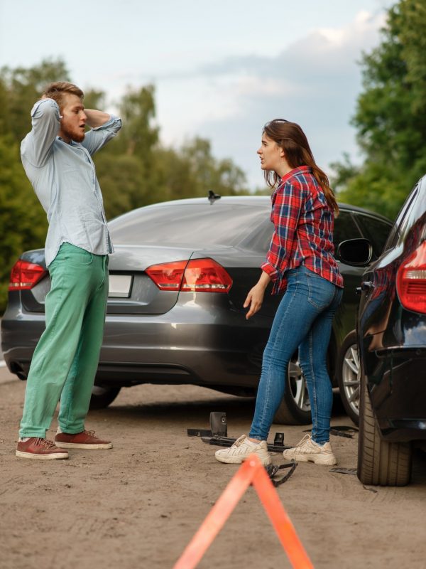 car-accident-on-road-man-and-woman-are-sorted-out.jpg